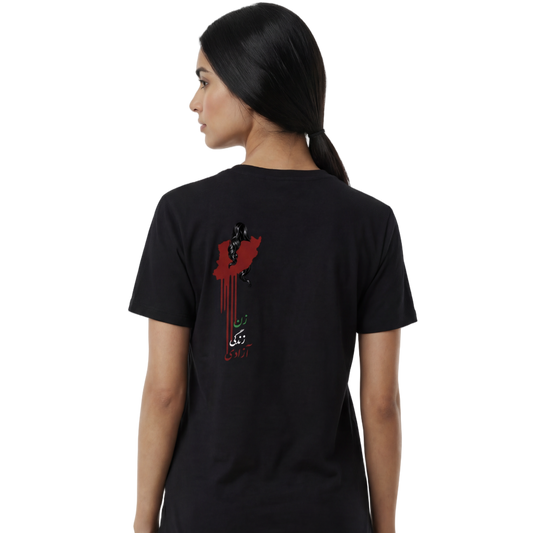 Person wearing a black t-shirt with a design on the back, standing against a white background