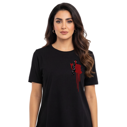 Woman wearing a black t-shirt with a red graphic design on a white background