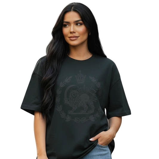 Woman wearing a black t-shirt with a logo and blue jeans on a white background